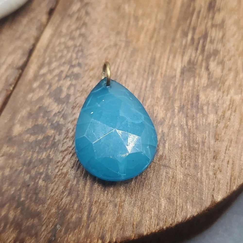 Glossy blue facet treasure pendant drop